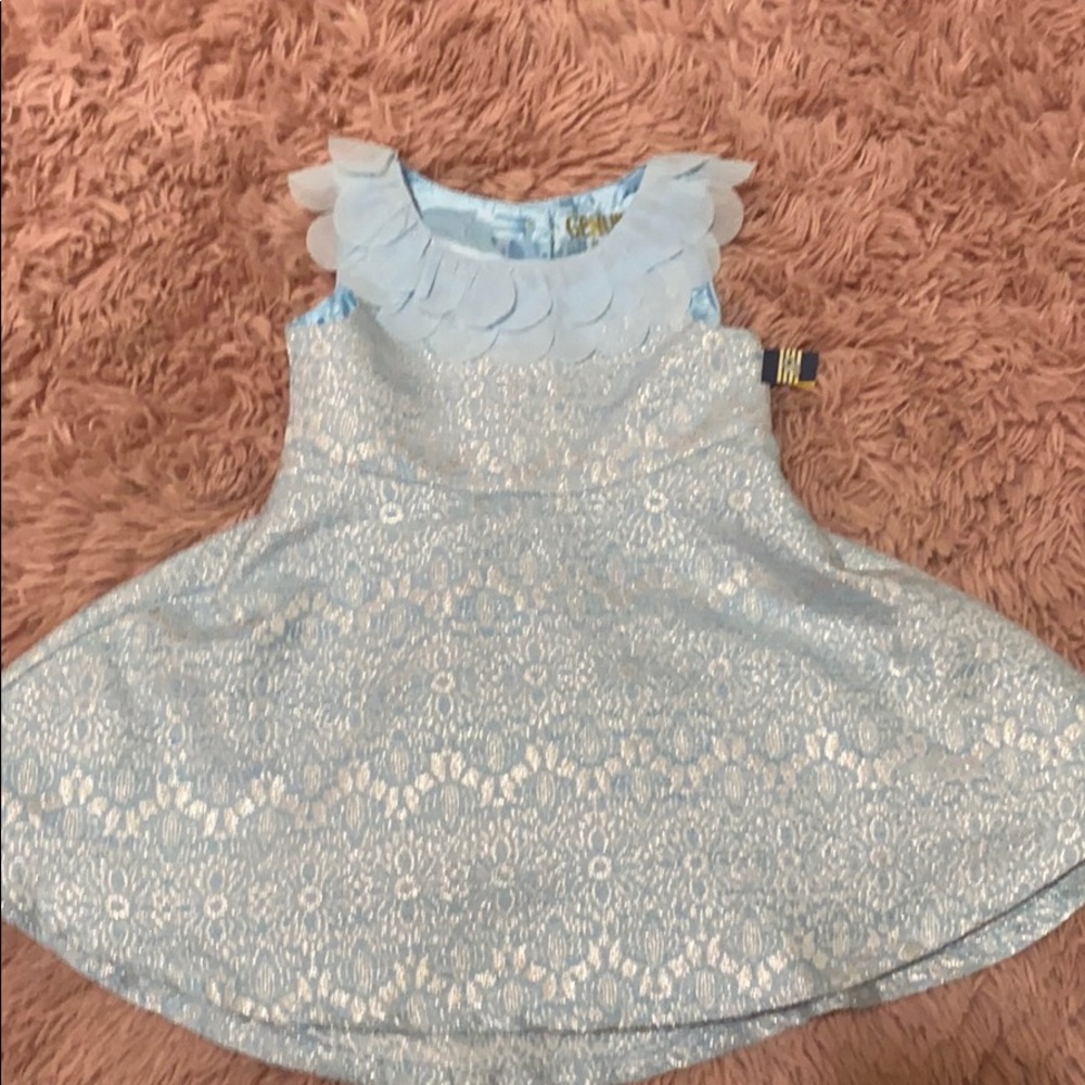 Light blue with silver stitch accents